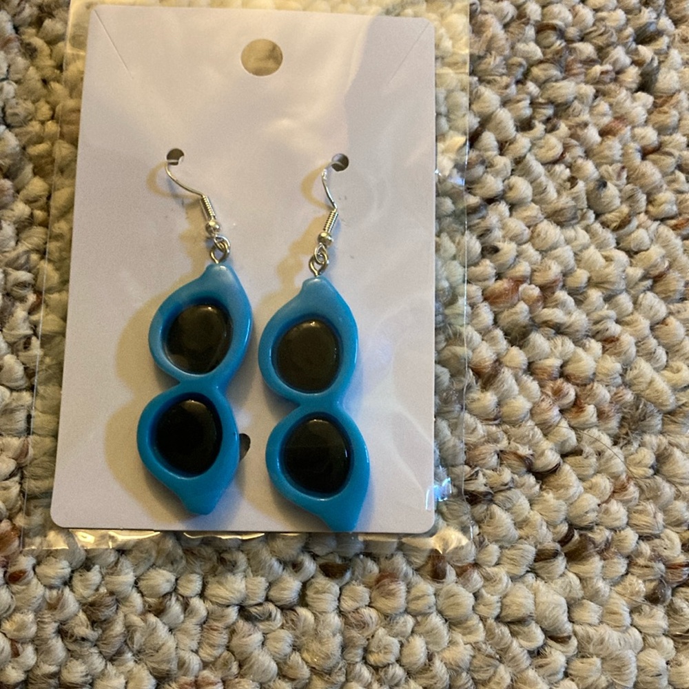 Blue “Sunglasses” earrings.